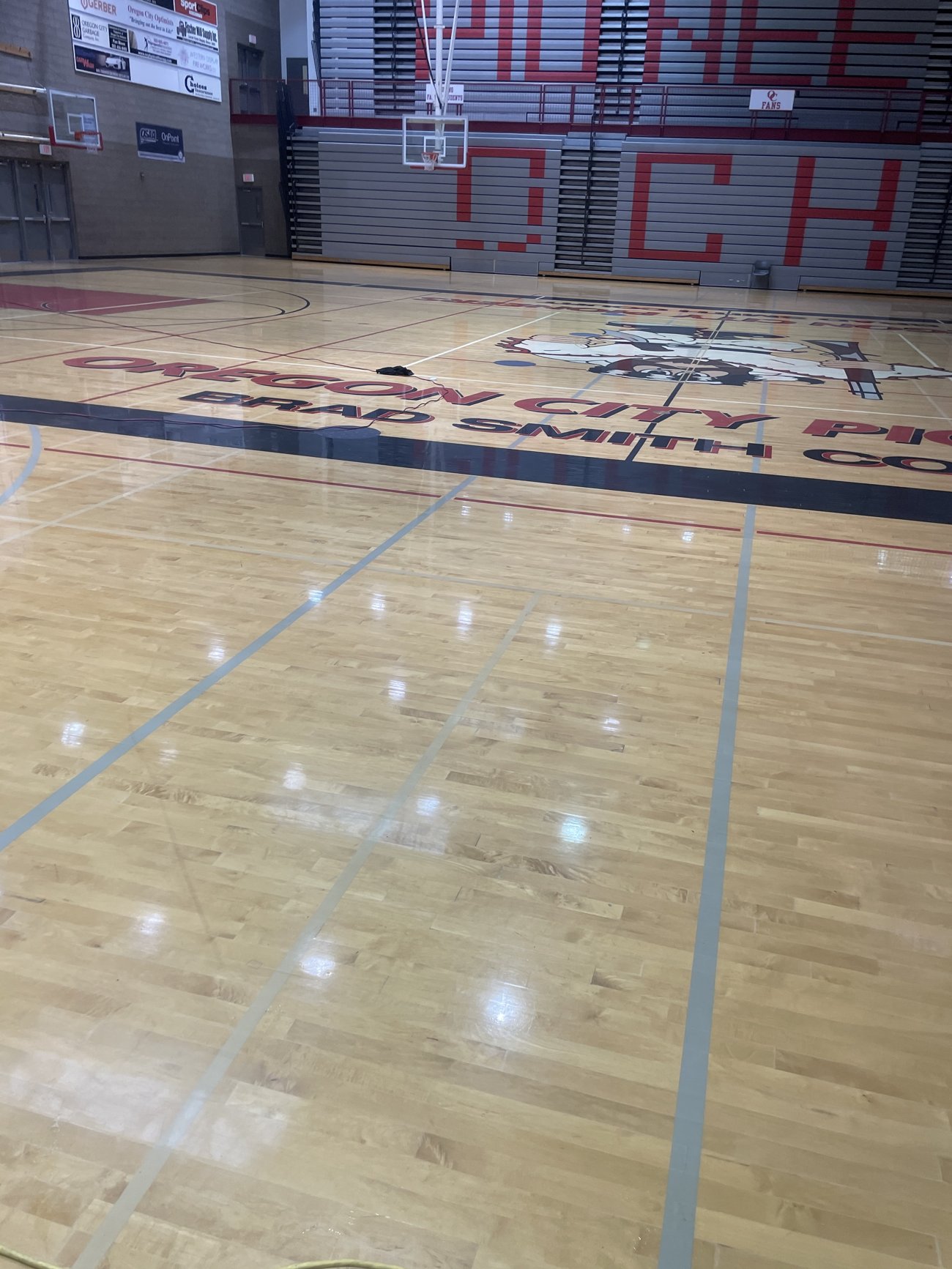 Refinished Oregon City gymnasium court, deep gloss
